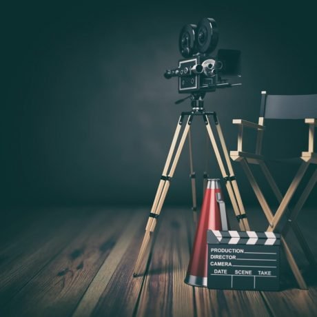 video-movie-cinema-concept-retro-camera-clapperboard-and-director-chair-3d.jpg